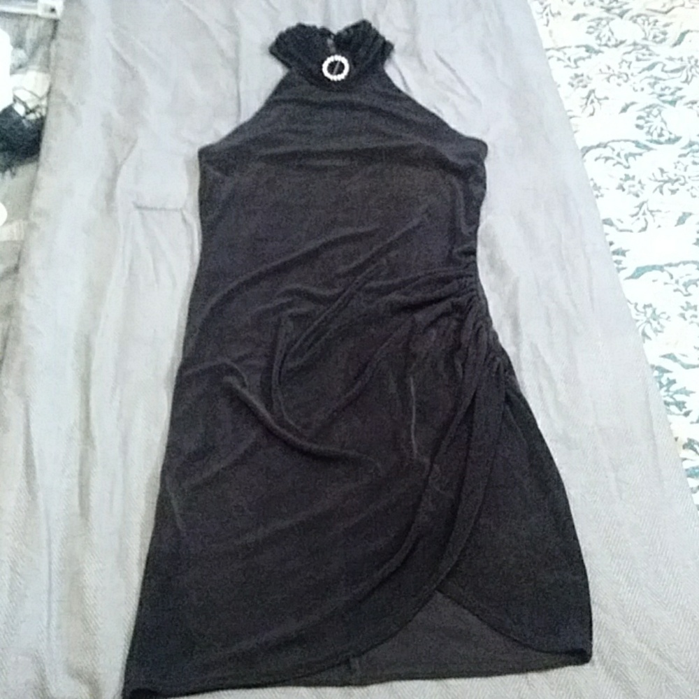 A little black dress. Worn once. Diamond studded b